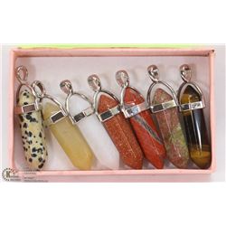 LOT OF SEVEN ASSORTED SEMI-PRECIOUS PENDANTS.