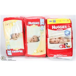 3 PACKAGES OF HUGGIES DIAPERS