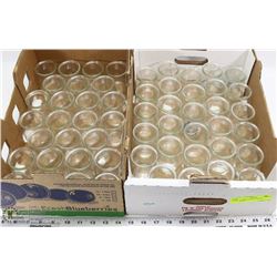 2 FLATS OF VOTIVE CANDLE HOLDERS.