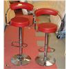 Image 1 : PAIR OF RED BAR STOOLS WITH FOOT REST.