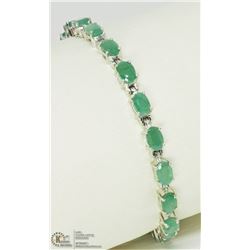 33) STERLING SILVER EMERALD 7" BRACELET
