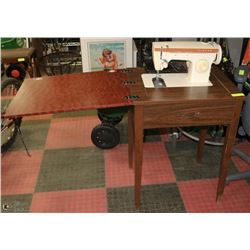 SINGER SEWING MACHINE IN CABINET