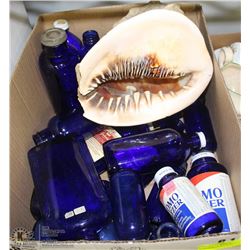 BOX OF BLUE BOTTLES.