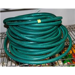 USED GREEN GARDEN HOSE