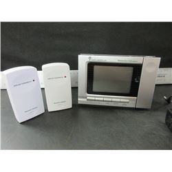 Hammacher Schlemmer radio controlled Alarm Clock  / with weather & temp