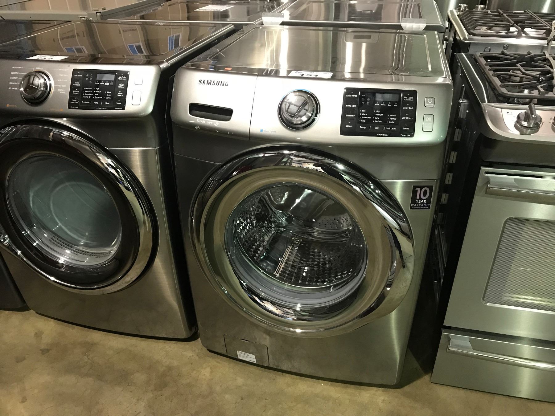 GREY AND STAINLESS FINISH SAMSUNG STEAM VRT FRONT LOADING WASHER MACHINE GREY AND STAINLESS FINISH SAMSUNG STEAM VRT FRONT LOADING WASHER MACHINE