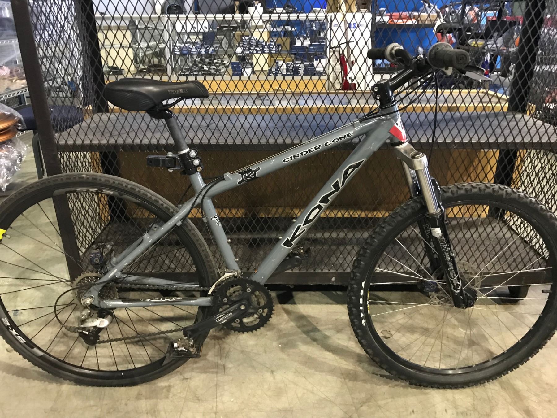 GREY KONA CINDER CONE 27 SPEED FRONT SUSPENSION MOUNTAIN BIKE WITH FRONT DISC BRAKES Able Auctions GREY KONA CINDER CONE 27 SPEED FRONT SUSPENSION MOUNTAIN BIKE WITH FRONT DISC BRAKES Able Auctions