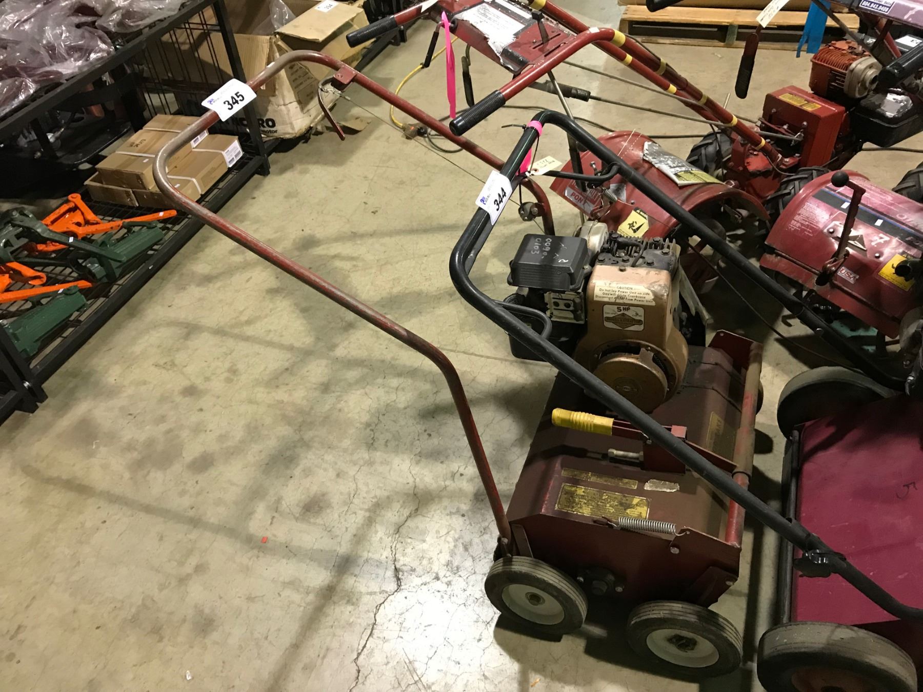 Gas Rake RED BRIGGS & STRATTON 5HP GAS POWERED POWER RAKE - Able Auctions