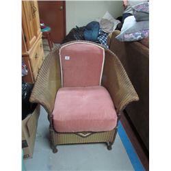 Antique wicker chair, apolstered seat with springs