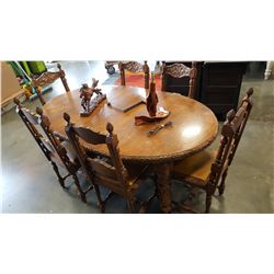 CARVED ANTIQUE CRANK DINGING TABLE W/ CRANK AND 2 LEAFS W/ 6 CHAIRS
