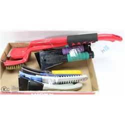 LOT OF BBQ BRUSHES AND MANY ICE SCRAPERS