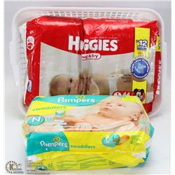2  PACKAGES OF HUGGIES DIAPERS,   KIDS