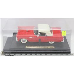 1:18 SCALE 1955 FORD THUNDERBIRD DIE CAST IN CASE.