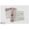 Image 1 : 2 HAIR COMBS WITH PINK CRYSTALS.