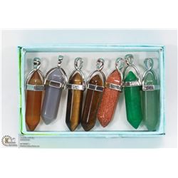 LOT OF 7 ASSORTED SEMI PRECIOUS PENDANTS.