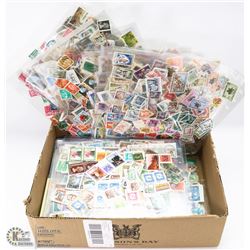 SCOTTS STAMP ALBUM WITH LARGE LOT OF LOOSE STAMPS