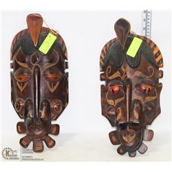 PAIR OF HAND CARVED WALL HANGING TRIBAL FACES