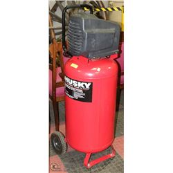 HUSKY 26 GALLON AIR COMPRESSOR . SOLD AS IS