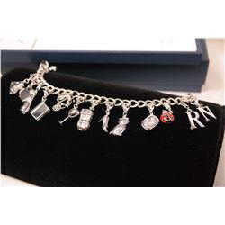 COLLECTIBLE BLUE NILE CHARM BRACELET WITH ORIGINAL BOX