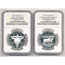 LOT OF (2) CENTENNIAL PROOF SILVER DOLLARS NGC 1982 REGINA PF 69 & 1985 NATIONAL PARKS PF 68