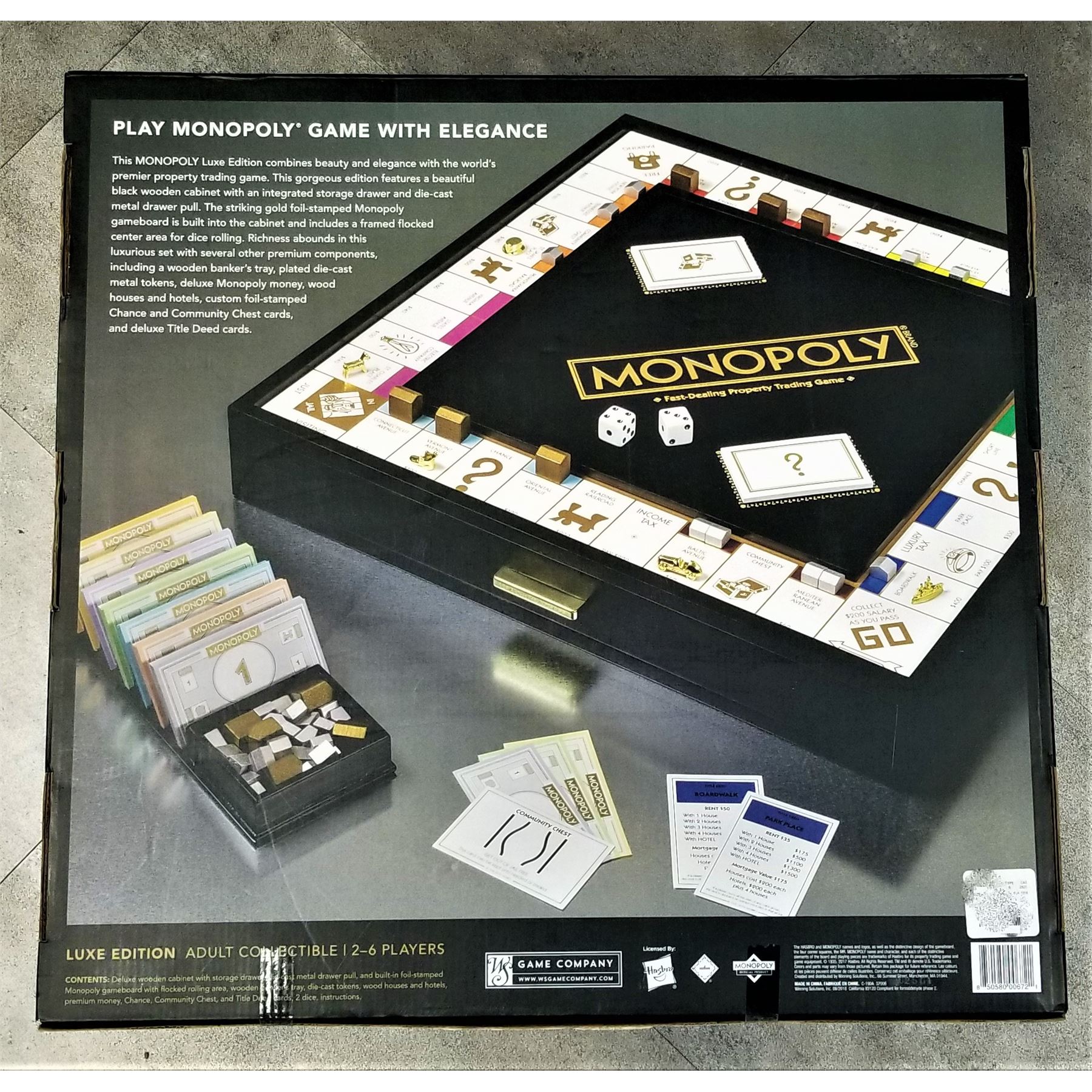 DELUXE EDITION MONOPOLY FAST DEALING PROPERTY TRADING GAME BLACK AND GOLD