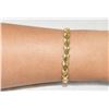Image 1 : Elegant two-texture creamy 14k Gold Bracelet