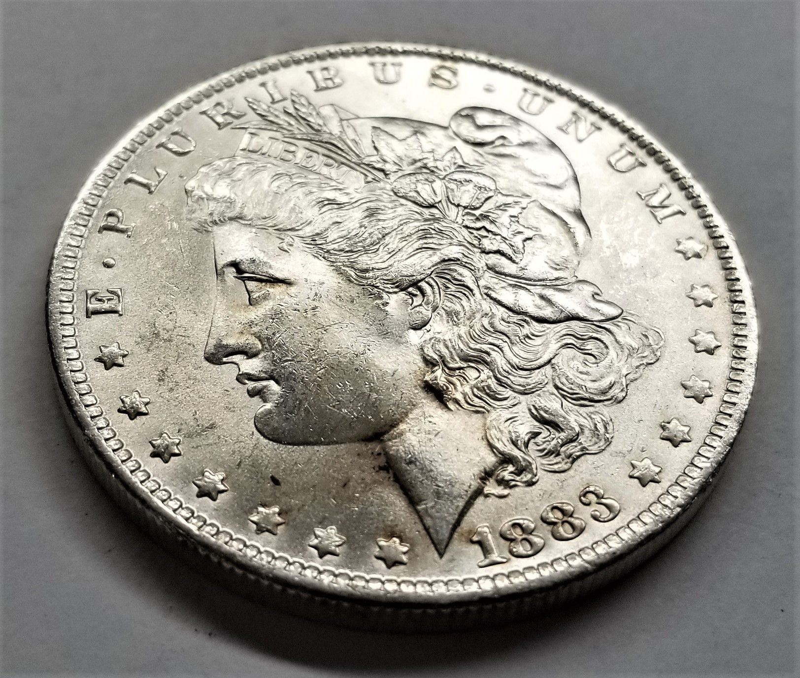 1883 O MS63 Morgan Silver Dollar 1883-o-ms63-morgan-silver-dollar