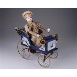 AN EXQUISITE FRENCH CLOCKWORK PHAETON WITH LADY DRIVER
