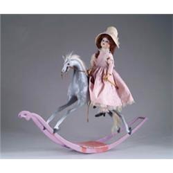 CLOCKWORK ROCKING HORSE WITH DOLL ASTRIDE