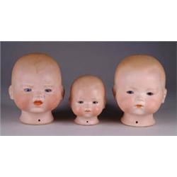 THREE BISQUE DREAM BABY HEADS