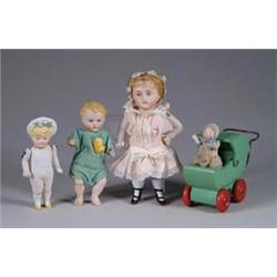 4 BISQUE DOLLS AND WOOD BABY COACH