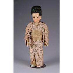 10” A M. ORIENTAL DOLL