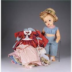 TERRY LEE COMPOSITION DOLL WITH A LARGE ASSORTMENT OF DOLL CLOTHES
