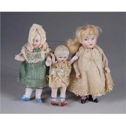 THREE MINI BISQUE-JOINTED DOLLS