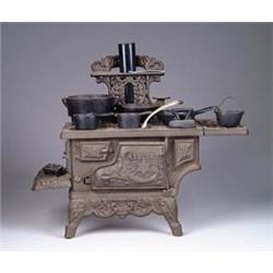 CRESCENT CAST IRON TOY STOVE