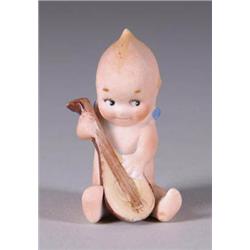 2in. SEATED KEWPIE PLAYING MANDOLIN