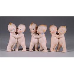THREE GERMAN KEWPIE HUGGERS