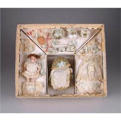 ALL ORIGINAL ALL BISQUE BABY WITH BOXED TROUSSEAU