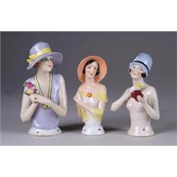 A FINE GROUPING OF THREE GERMAN FLAPPER PINCUSHIONS
