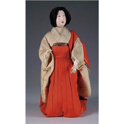 10in. KNEELING ORIENTAL EGG SHELL DOLL