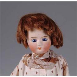 7in. MECHANICAL WALKING DOLL