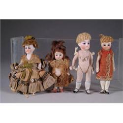FOUR GLASS-EYED ALL BISQUE DOLLS