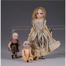 LOT OF THREE SMALL DOLLS WITH COMPOSITION BODIES