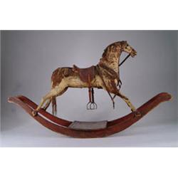 CHILD'S RIDE ON ROCKING HORSE