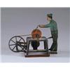 Image 1 : WORKER AT GRINDING WHEEL