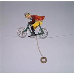 TIN FIGURAL CHARLIE CHAPLIN STRING RIDER