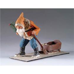 SANTA TRUDGER WITH SLED