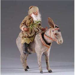 SANTA RIDING NODDING DONKEY