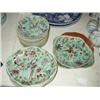 Image 1 : A celadon-glazed 16-piece dessert service with polychrome floral and exotic bird design....