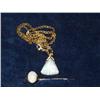 Image 1 : A triangular white opal and diamond-set pendant on a 9ct gold flattened belcher link chain, with...